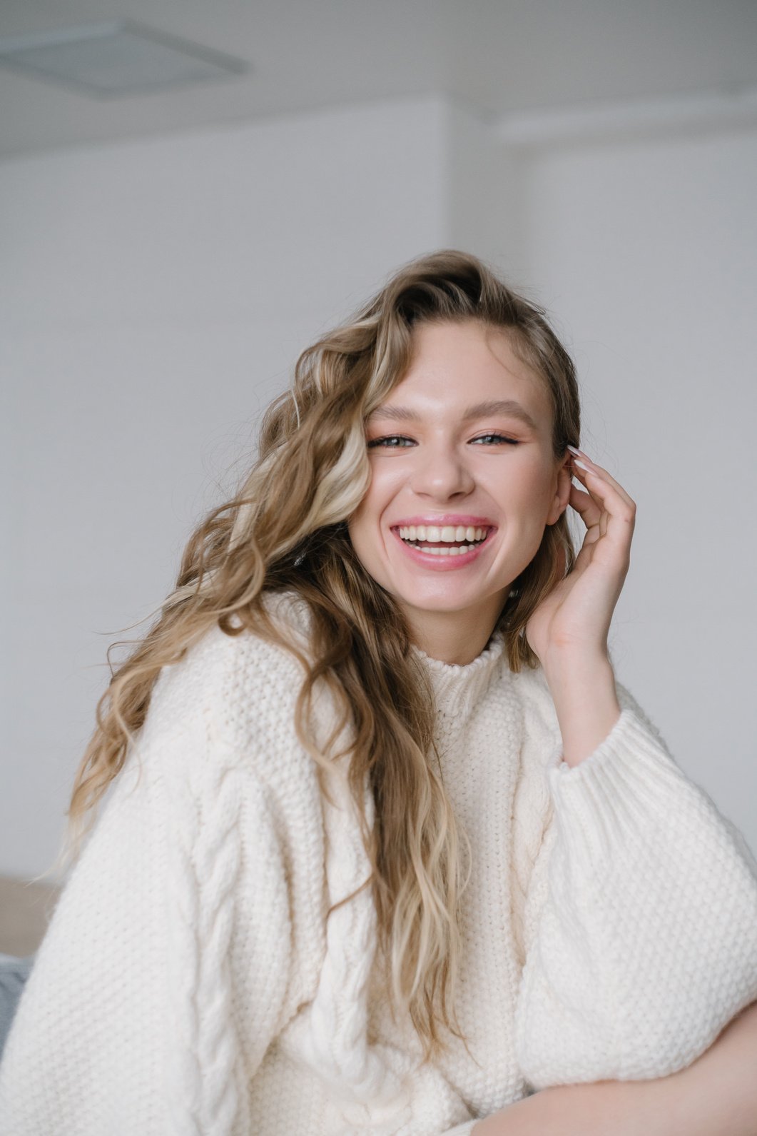 A Happy Woman in a Sweater